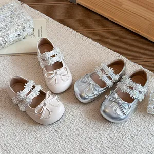 Sweet girls leather princess shoes featuring flower pearl straps and delicate bow details
