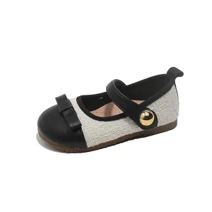 Elegant tweed Mary Jane princess shoes for girls with black bow and gold button detail