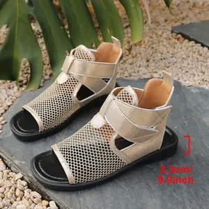Close-up detail view of gold mesh flat sandals showing sole height of 2.3cm and 0.9inch