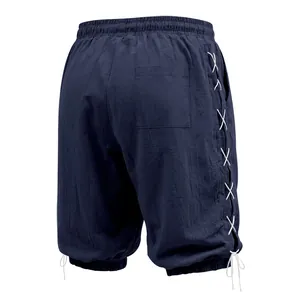 Back view of men's blue linen cropped pants with stylish white side lacing detail