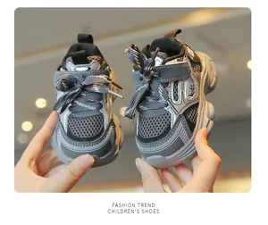 Close-up of breathable mesh toddler chunky sneakers with grey and black design
