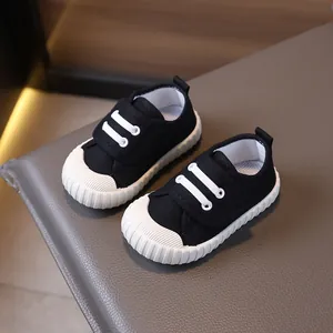 Scarpe di tela nera per bambini con suole morbide e chiusura a strappo per neonati e bimbi