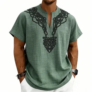 Close-up of intricate black Celtic knot print on green bamboo linen men's shirt