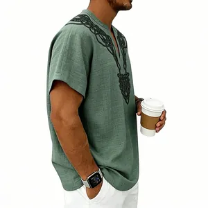 Detailed side view of men's green slub linen shirt featuring intricate black neck prints