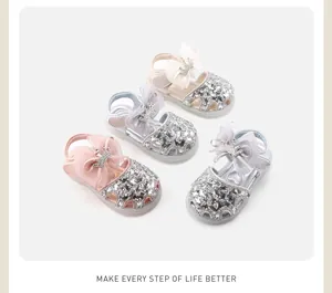 Detailed view of toddler girl princess shoes with sequins and bow crown accents