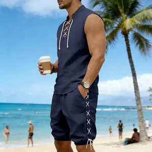 Men's casual linen sleeveless top and shorts set with lace-up design on tropical beach.