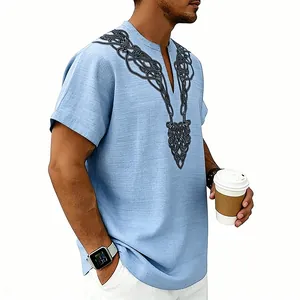 Close-up detail of men's light blue slub linen v-neck shirt with black rune print