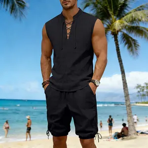 Men's black sleeveless linen set with lace-up collar and drawstring shorts on beach