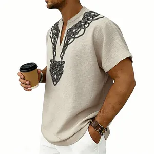 Close-up of men's beige linen shirt featuring intricate black rune print on V-neckline