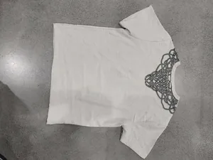 Back view of minimalist men's slub linen V-neck T-shirt with black runic knot print detail