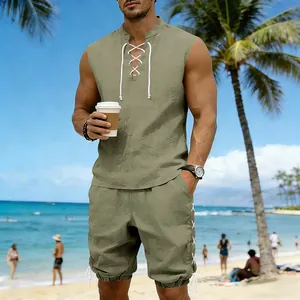 Close-up of olive green sleeveless linen set showing lace-up neck and drawstring shorts.