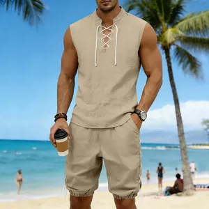 Close-up detail of a men's linen lace-up sleeveless top and matching shorts on a sunny beach