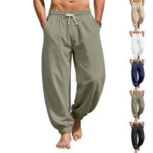 Detail view of men's loose linen beach joggers showing multiple color options