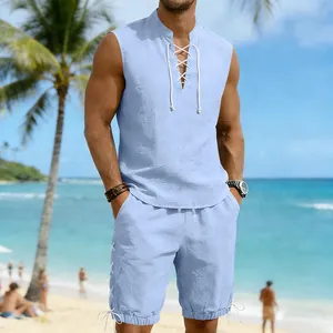 Detailed view of men's light blue linen sleeveless beach set in tropical setting