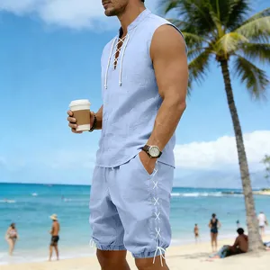 Men's light blue sleeveless linen set with drawstring design shown in beach setting