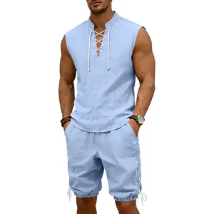 Close-up of light blue linen-style sleeveless top and matching shorts with lace-up detail.