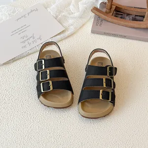 Classic black children's Birkenstock style sandals with cork soles and open toe design