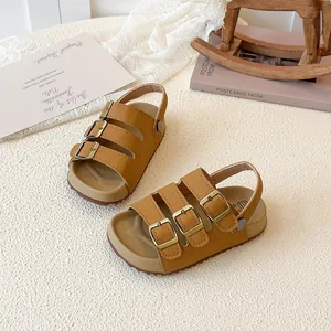 Brown toddler three-strap sandals with cork sole and metal buckles for summer