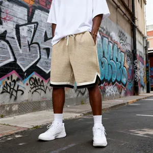 Street style view of khaki grid textured shorts with contrast hem and drawstring