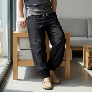 Comfortable casual men's black linen joggers with drawstring waist and elastic cuffs