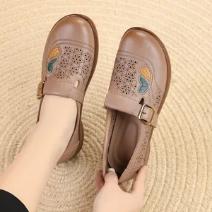 Comfortable brown leather loafers for women with butterfly embroidery and breathable cut-outs