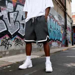 Men's dark gray quilted casual shorts featuring a loose fit in a street style setting