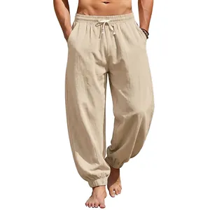 Close-up of men's casual linen joggers featuring drawstring waist and elastic cuffs.