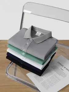Premium men's ice silk polo shirts stacked in various colors on a modern transparent chair