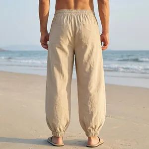 Back view of breathable khaki linen jogger pants for men's summer beach leisure wear
