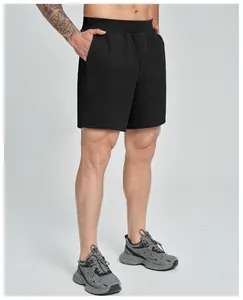 Detailed view of men's black quick-dry athletic shorts for fitness and gym
