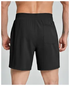 Back view of men's black quick-dry sports shorts showing pocket detail and fit