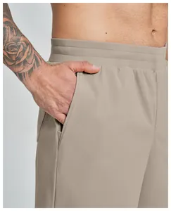 Close-up of side pocket and elastic waistband on men's quick-dry sports shorts