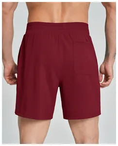 Detailed back view of men's burgundy quick-dry athletic shorts showing pocket and fit