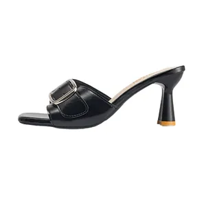 Elegant black high heel mules for women featuring a stylish belt buckle and square toe