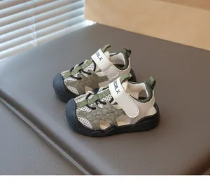 Macro view of breathable mesh toddler sandals with soft anti-slip rubber soles