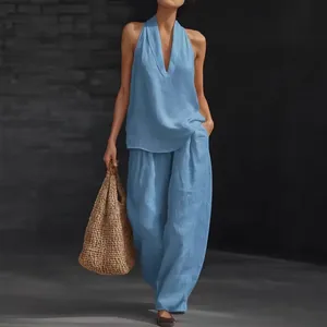 Stylish light blue V-neck halter sleeveless top and wide-leg trouser set for women