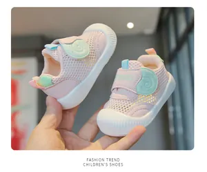 Close-up of pink breathable mesh baby walking shoes with anti-slip soft soles