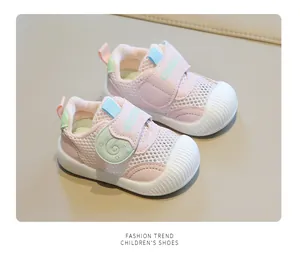 Detailed macro view of pink breathable mesh baby toddler shoes with soft anti-slip soles