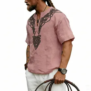Detail of men's pink slub linen t-shirt with a retro Celtic knot V-print casual design