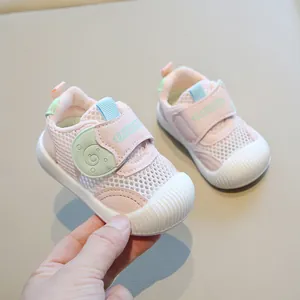 Breathable pink mesh baby walking shoes with soft non-slip soles and velcro straps