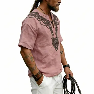Close-up showing the intricate Celtic knot pattern on a retro pink slub linen t-shirt.