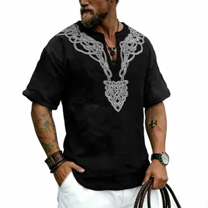 Detailed view of the vintage Celtic knot V-neck print on a black slub linen t-shirt