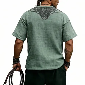 Back view of a sage green slub linen T-shirt featuring a vintage Celtic knot print