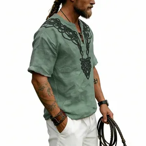 Detail of men's vintage Celtic knot V-neck slub linen t-shirt in sage green.