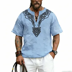 Detail view of retro Celtic knot print on a light blue V-neck linen t-shirt for men.