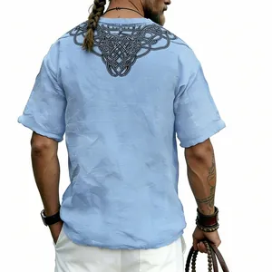 Back view detail of the vintage Celtic knot V-print on light blue slub linen T-shirt