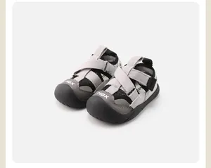 Grey toddler sport sandals with closed-toe design and breathable mesh material