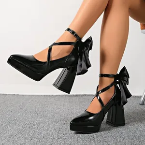 Elegant black bow chunky high heels with cross ankle straps and pointed toe design