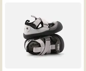 Close-up detail of grey toddler sports sandals featuring closed-toe and breathable mesh.