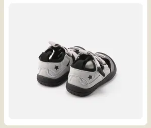 Detail view of grey breathable mesh toddler sandals featuring non-slip rubber soles